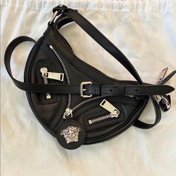 Versace Handbags - New Versace Black Italian Leather Shoulder mini Hobo Bag w Silver Medusa Charm